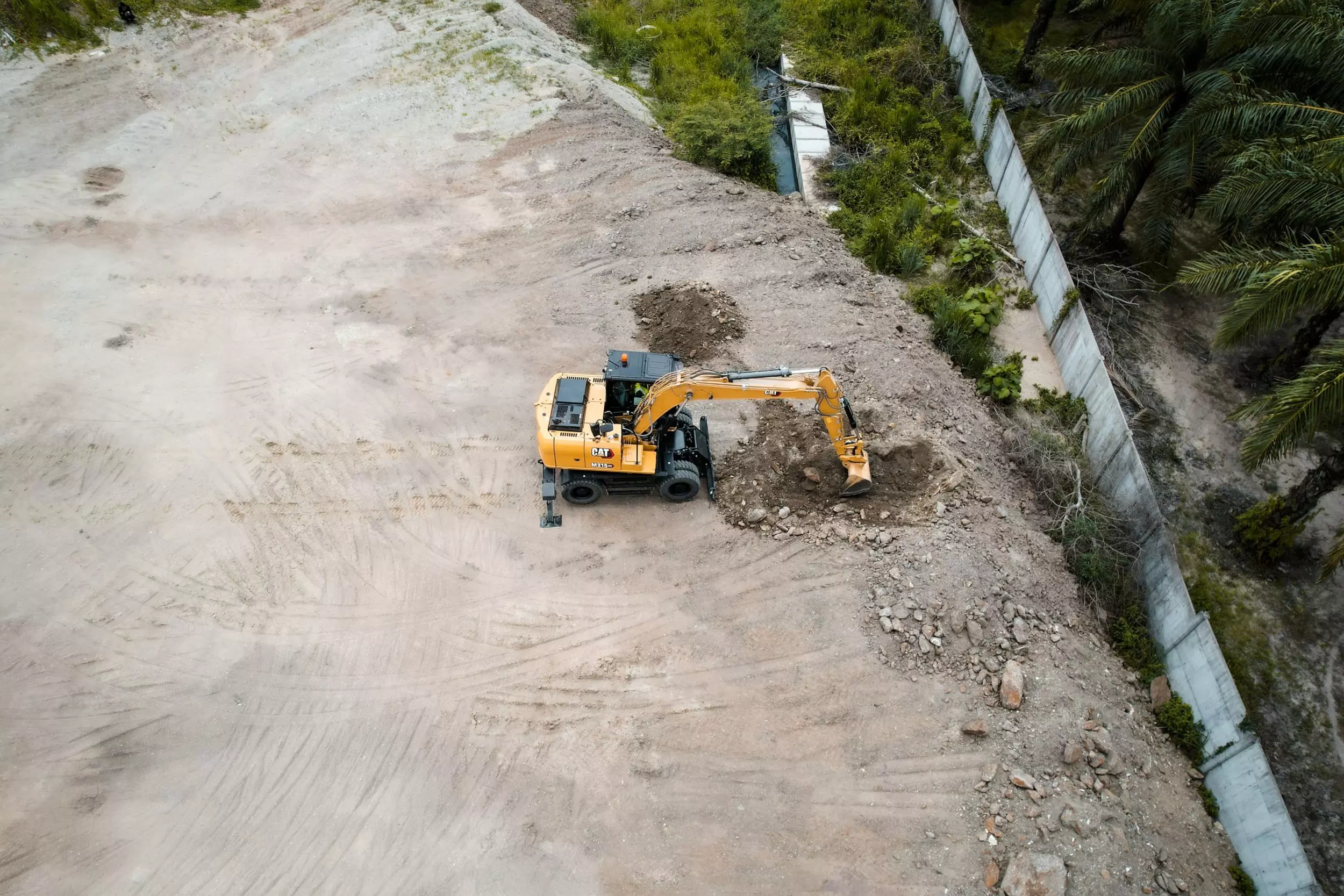 Caterpillar M315 GC, Колесные экскаваторы