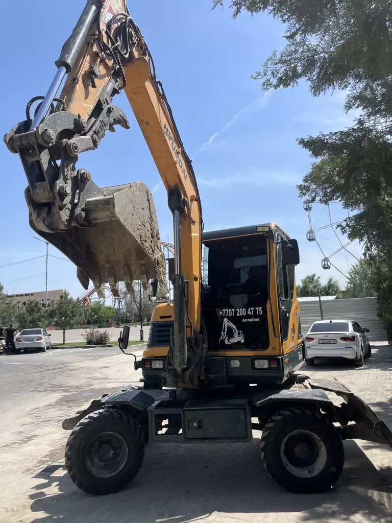 Hyundai R55-7A, Экскаваторы-погрузчики