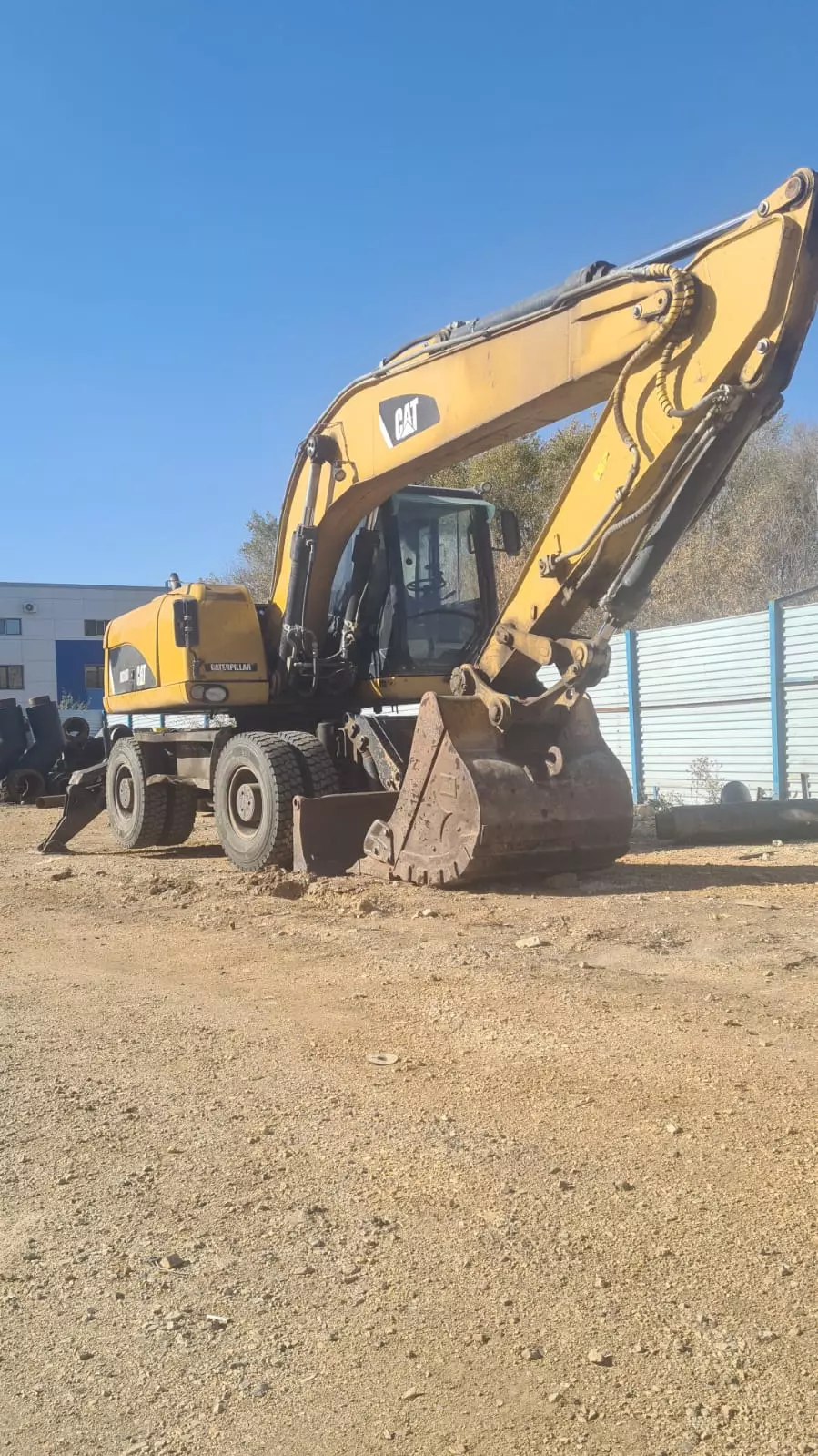 Caterpillar 318, Колесные экскаваторы