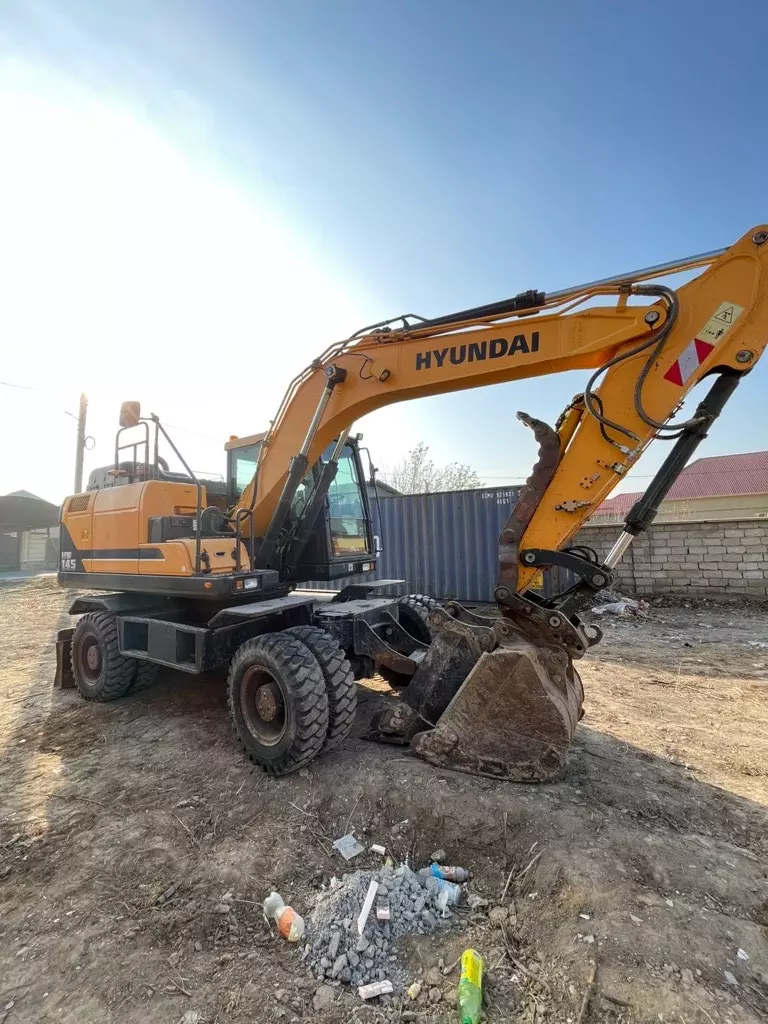 HYUNDAI R140, Колесные экскаваторы