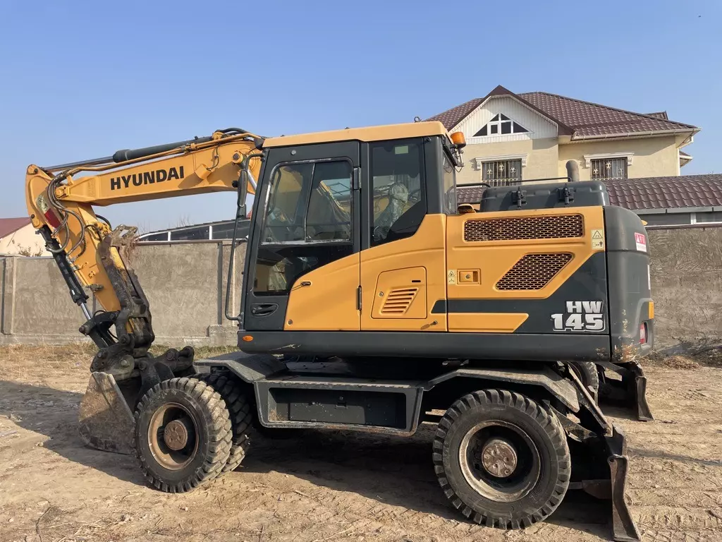 HYUNDAI R140, Колесные экскаваторы