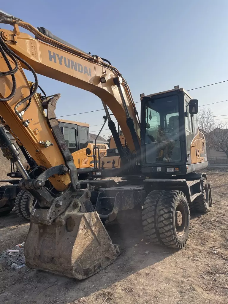 HYUNDAI R140, Колесные экскаваторы