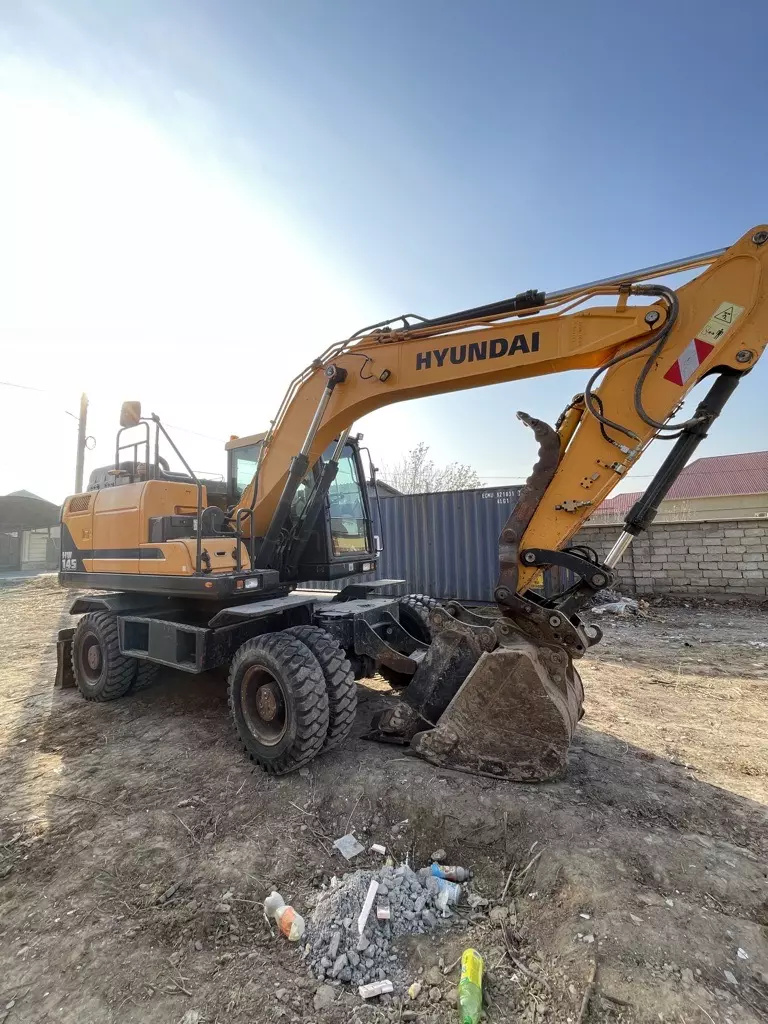 HYUNDAI R140, Колесные экскаваторы