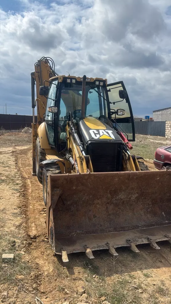 Caterpillar 428E, Экскаваторы-погрузчики