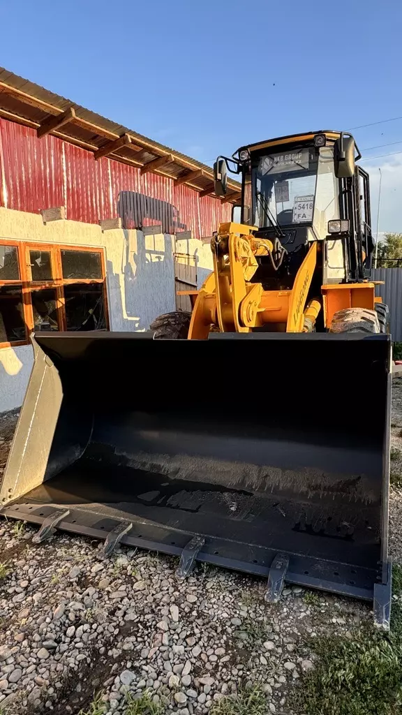 Фронтальные погрузчики