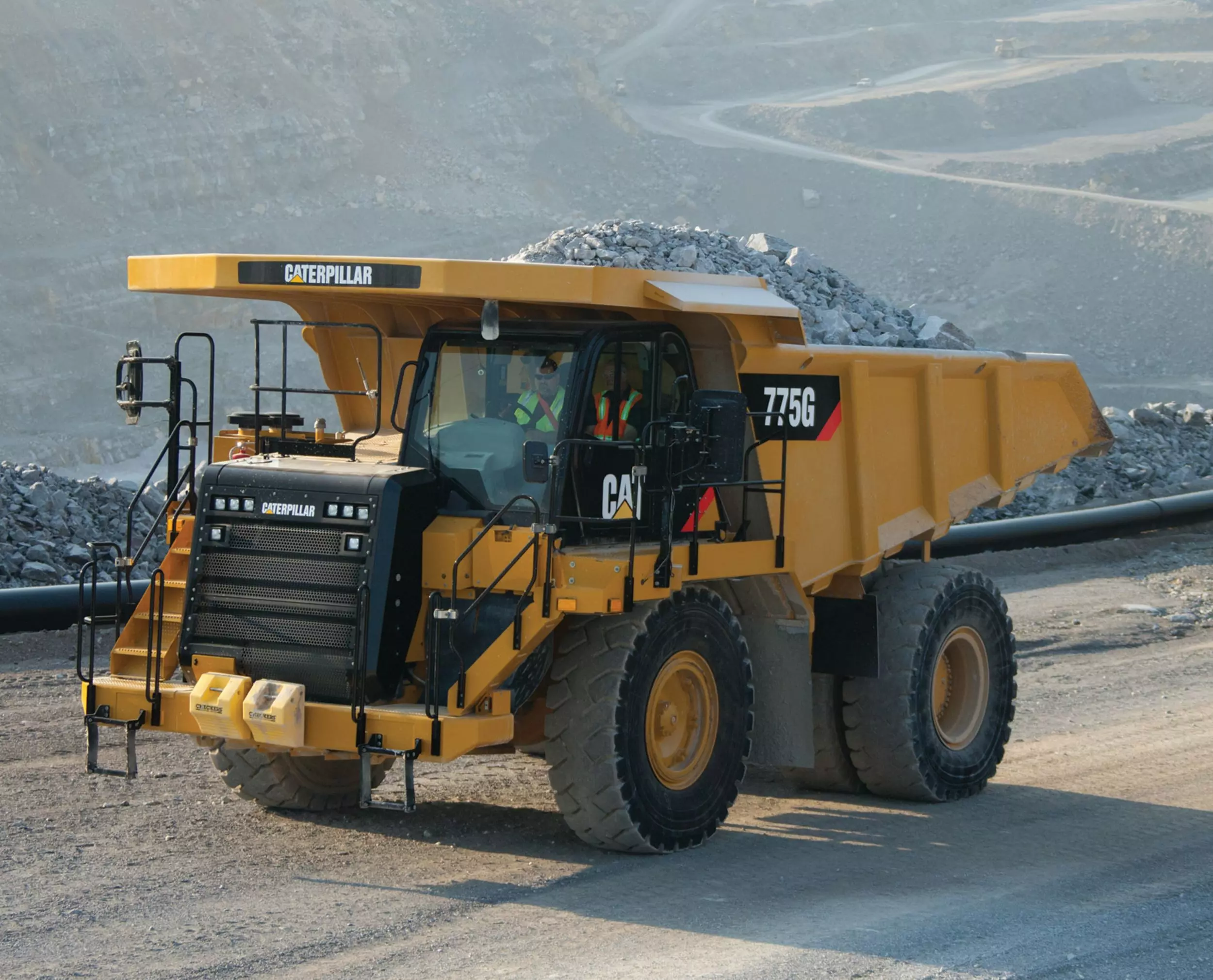 Caterpillar 775G, Карьерные самосвалы
