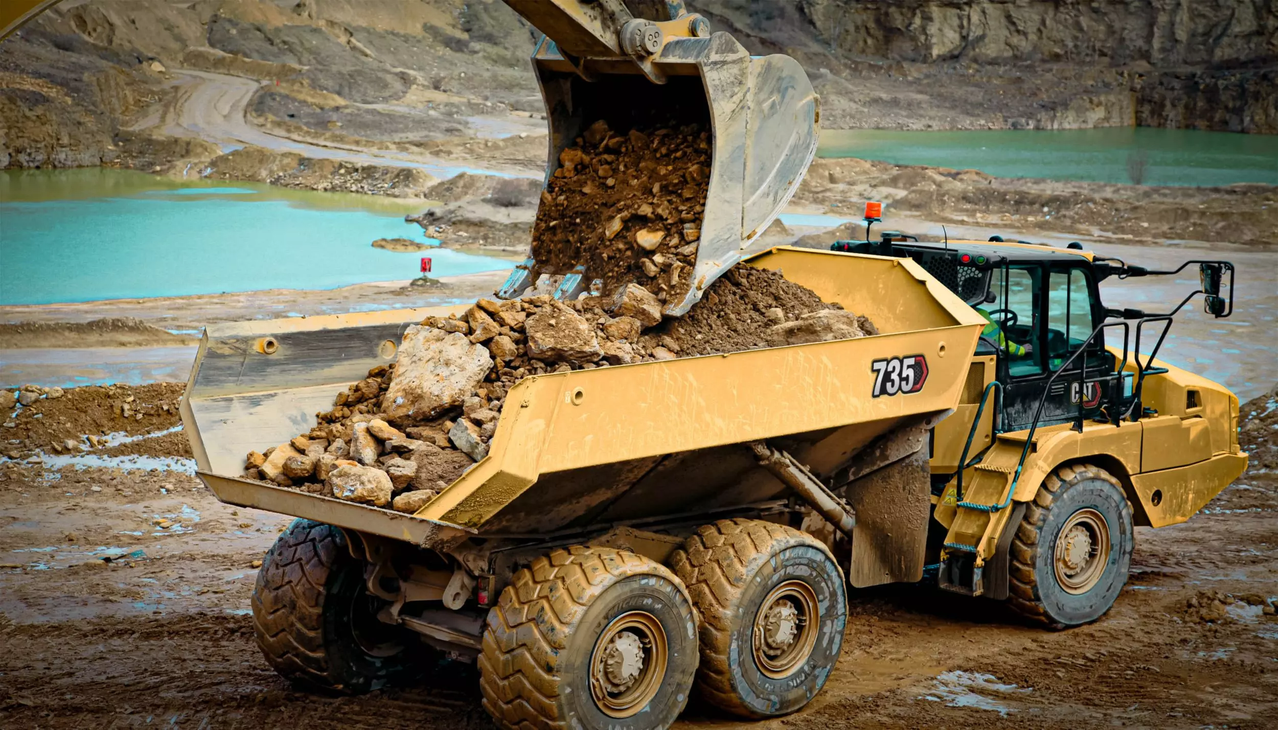 Cat 735, Шахтные самосвалы