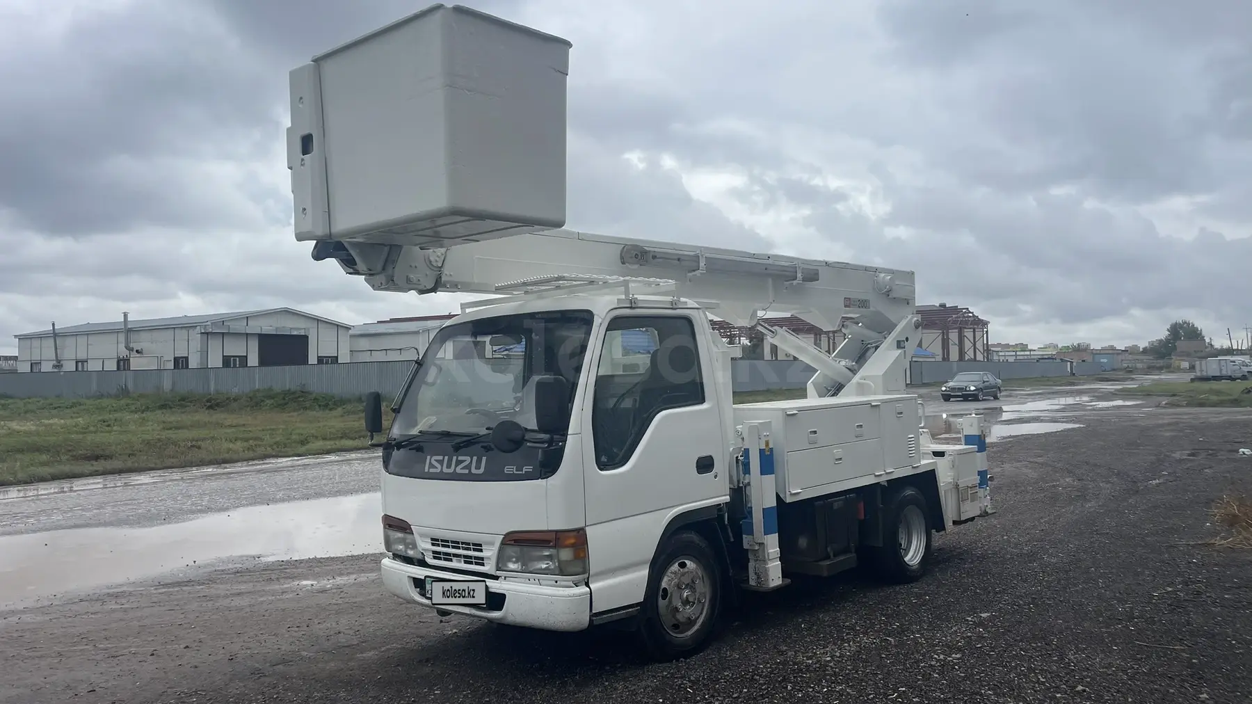 Isuzu Elf 5.2 (автогидроподъемник)