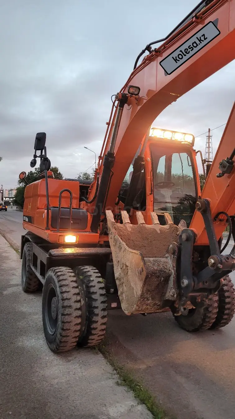 Doosan DX140W