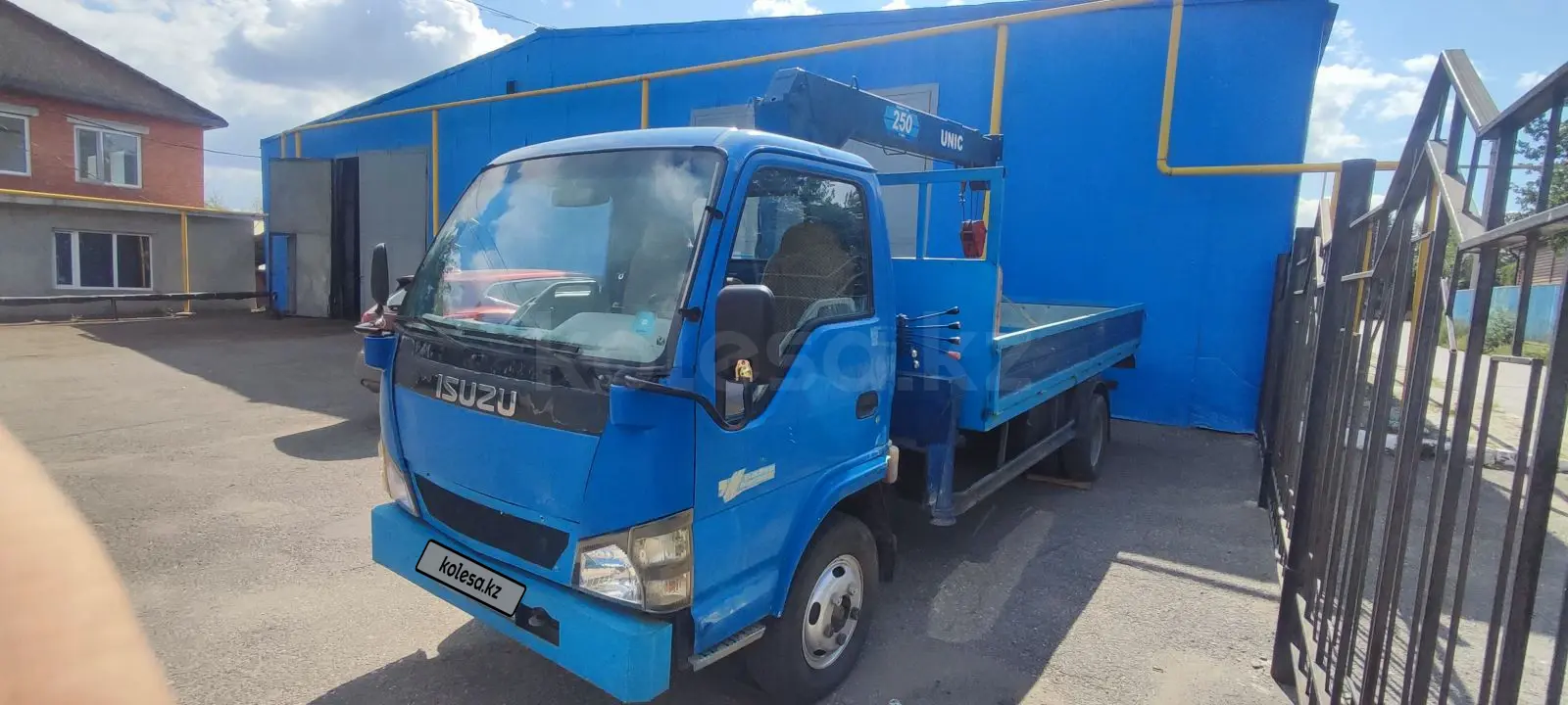 Isuzu Elf 5.2 (автогидроподъемник)