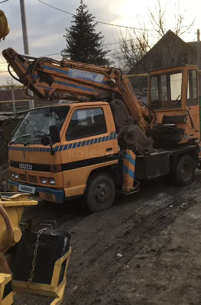 Isuzu Elf 5.2 (автогидроподъемник)