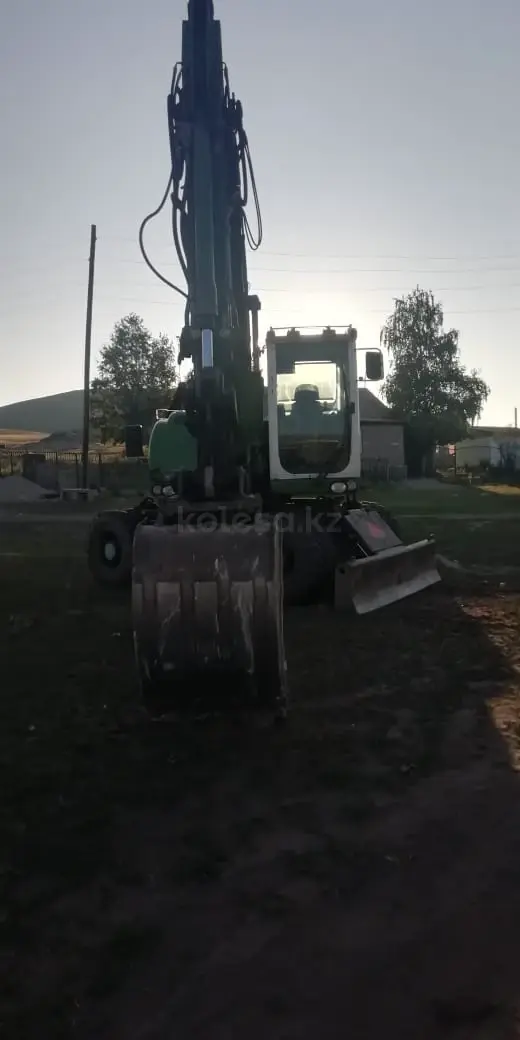 Caterpillar M313D